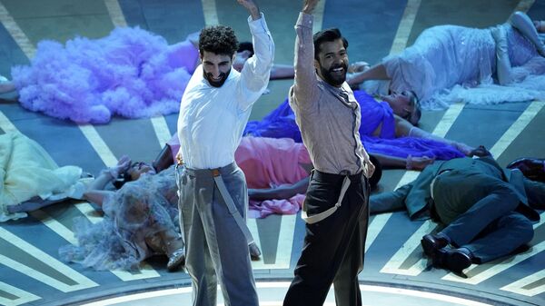 A performance of the song Naatu Naatu from RRR at the Oscars on Sunday, March 12, 2023, at the Dolby Theatre in Los Angeles. - Sputnik भारत