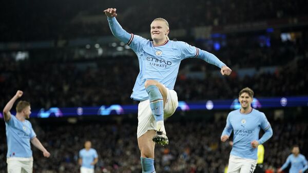 Manchester City's Erling Haaland celebrates after scoring his side's 5th goal during the Champions League round of 16 second leg soccer match between Manchester City and RB Leipzig at the Etihad stadium in Manchester, England, Tuesday, March 14, 2023. - Sputnik India