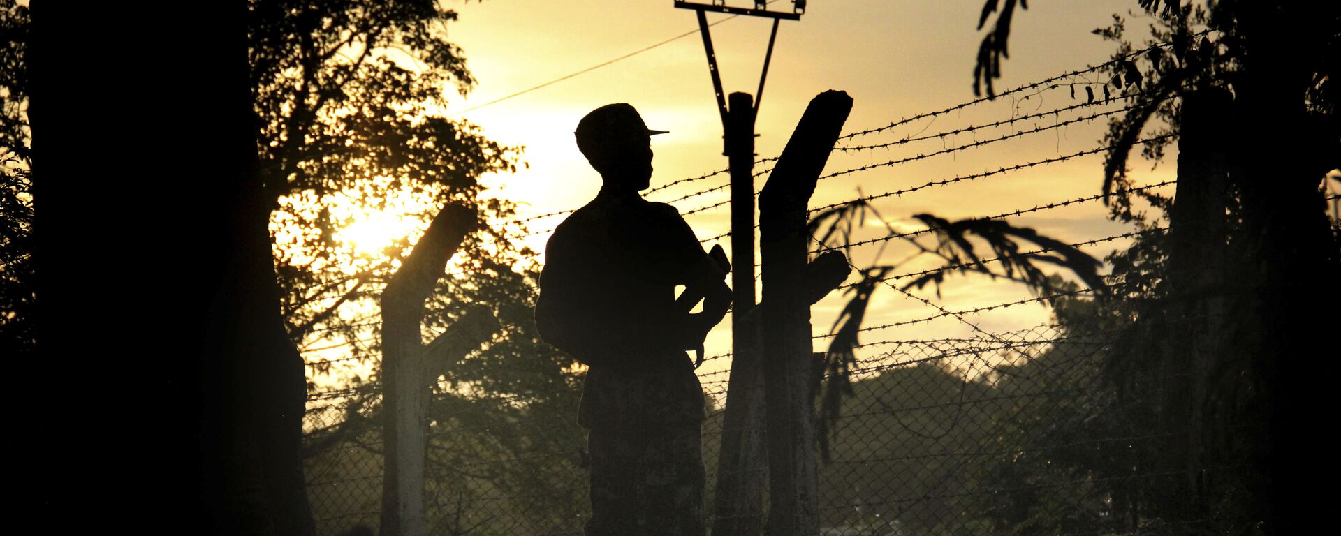 A Border Guard Police officer stands at a police post that was previously attacked by a Muslim terrorist group in Kyee Kan Pyin Buthidaung in which the Myanmar government and military claim the existence of Muslim terrorists, in Rakhine state Myanmar, on Friday, July 14, 2017 - Sputnik India, 1920, 17.11.2023