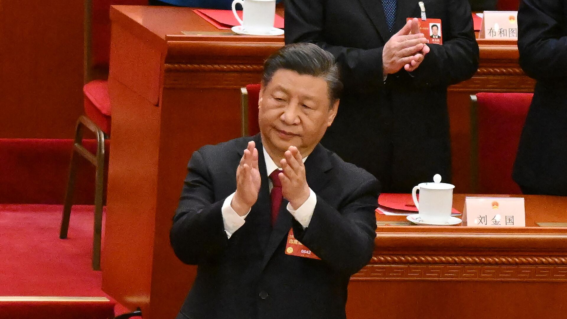China's President Xi Jinping applauds after the closing session of the National People's Congress (NPC) at the Great Hall of the People in Beijing on March 13, 2023. - Sputnik India, 1920, 17.03.2023