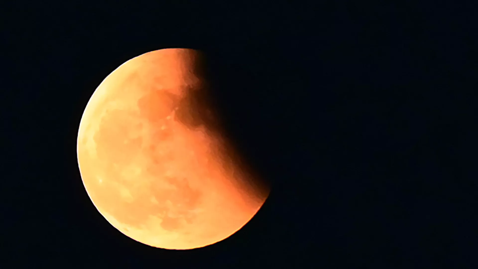 The 'Blood Moon' is seen during a total lunar eclipse in Prayagraj on November 8, 2022.