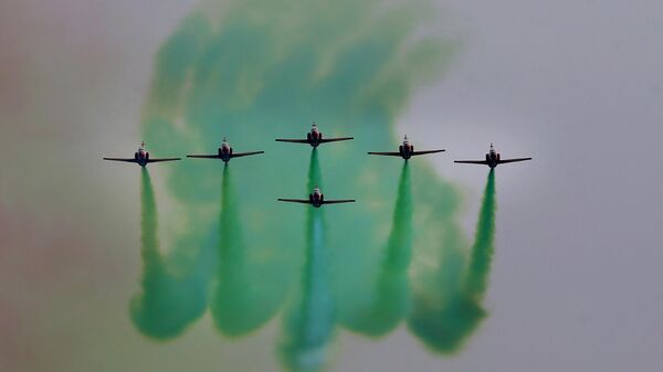 Pakistan Air Force jets demonstrate an aerobatic performance during a military parade to mark Pakistan National Day in Islamabad, Pakistan, Wednesday, March 23, 2022. - Sputnik India