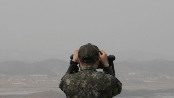 A South Korean army soldier watches the North Korea side from the Unification Observation Post in Paju, South Korea, near the border with North Korea, Friday, March 24, 2023. - Sputnik भारत