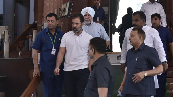 Indian opposition leader Rahul Gandhi leaves parliament building in New Delhi, Friday, March 24, 2023. - Sputnik भारत