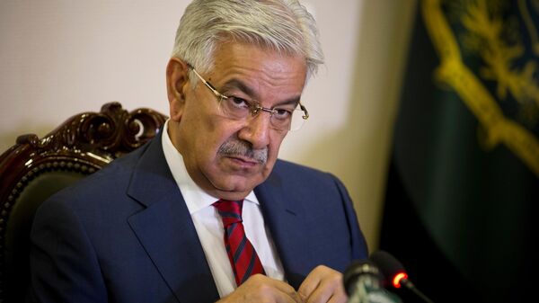 In this April 2, 2018, file photo, Pakistan's Foreign Minister Khawaja Mohammad Asif listens to a reporter at the Foreign Ministry in Islamabad, Pakistan. - Sputnik India