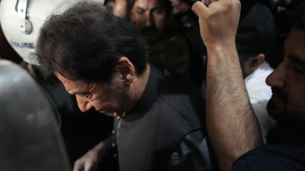 Former Prime Minister Imran Khan leaves after appearing in a court, in Lahore, Pakistan, Friday, March 24, 2023. - Sputnik भारत