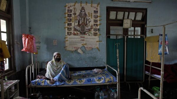 An Indian tuberculosis patient rests on a bed at a TB hospital on World Tuberculosis Day in Gauhati, India, Saturday, March 24, 2018. - Sputnik India