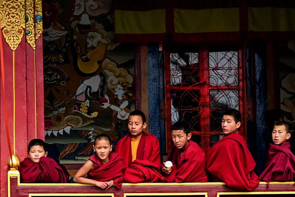 A young Buddhist monk drinks his morning tea at the main Tawang monastery in Tawang, a town in the northeast Indian state of Arunachal Pradesh on April 5, 2023. (Photo by Arun SANKAR / AFP) - Sputnik India
