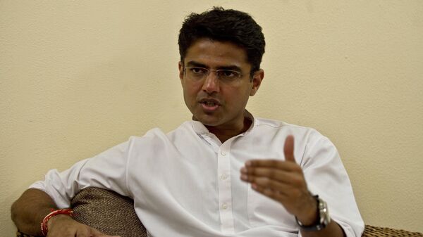 Indian Minister of Corporate Affairs Sachin Pilot gestures during an interview with AFP at his residence in New Delhi on September 27, 2013.  - Sputnik भारत