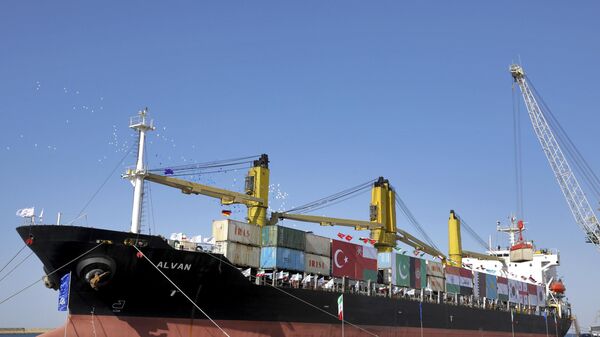 A cargo ship is docked during the inauguration ceremony of the newly built extension in the port of Chabahar on the Gulf of Oman, southeastern Iran, near the Pakistani border, Sunday, Dec. 3, 2017. - Sputnik India