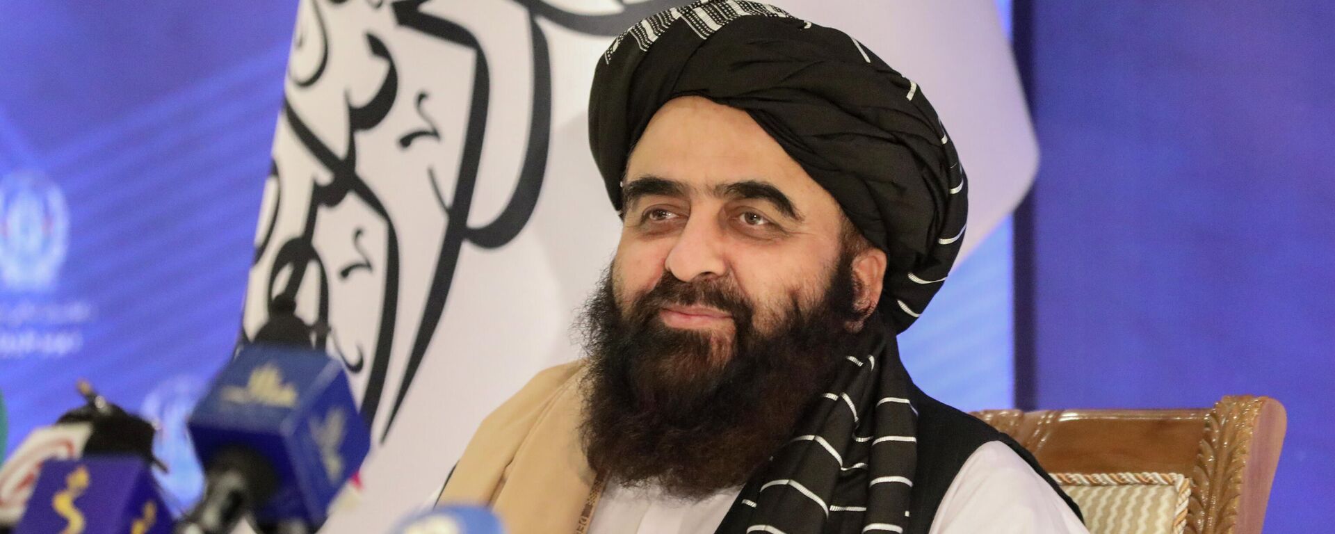 The foreign minister in Afghanistan’s new Taliban-run Cabinet, Amir Khan Muttaqi, gives a press conference in Kabul, Afghanistan, Tuesday, Sept. 14, 2021.  - Sputnik India, 1920, 14.04.2023
