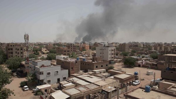 Smoke is seen rising from Khartoum's skyline, Sudan, Sunday, April 16, 2023. - Sputnik भारत