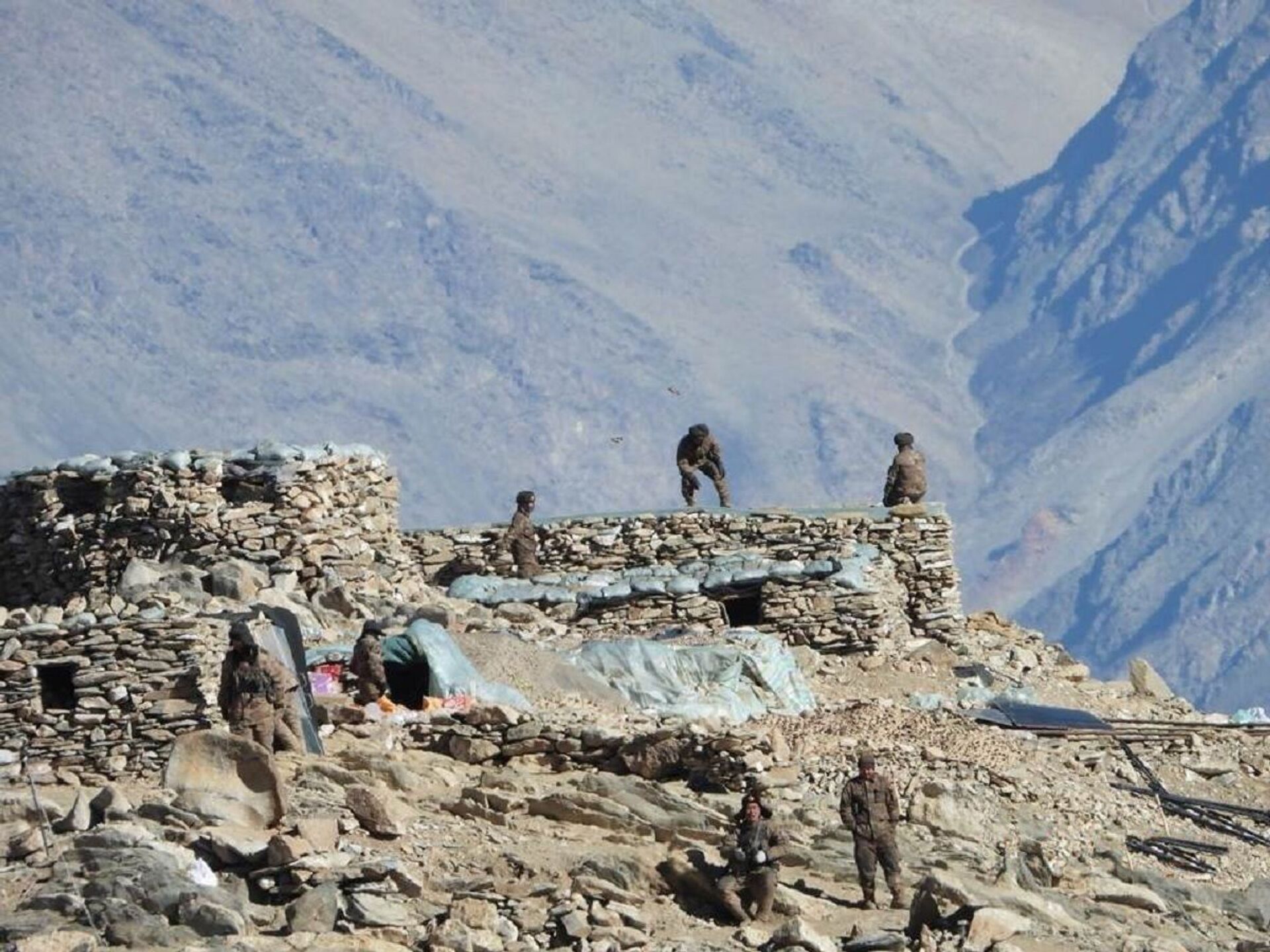 This photograph provided by the Indian Army, according to them shows Chinese troops dismantling their bunkers at Pangong Tso region, in Ladakh along the India-China border on Monday, Feb.15, 2021 - Sputnik India, 1920, 11.08.2023