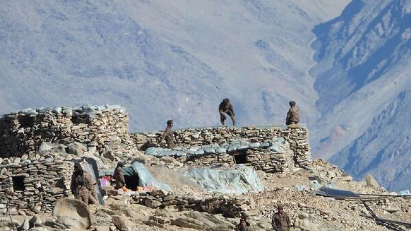 This photograph provided by the Indian Army, according to them shows Chinese troops dismantling their bunkers at Pangong Tso region, in Ladakh along the India-China border on Monday, Feb.15, 2021 - Sputnik India