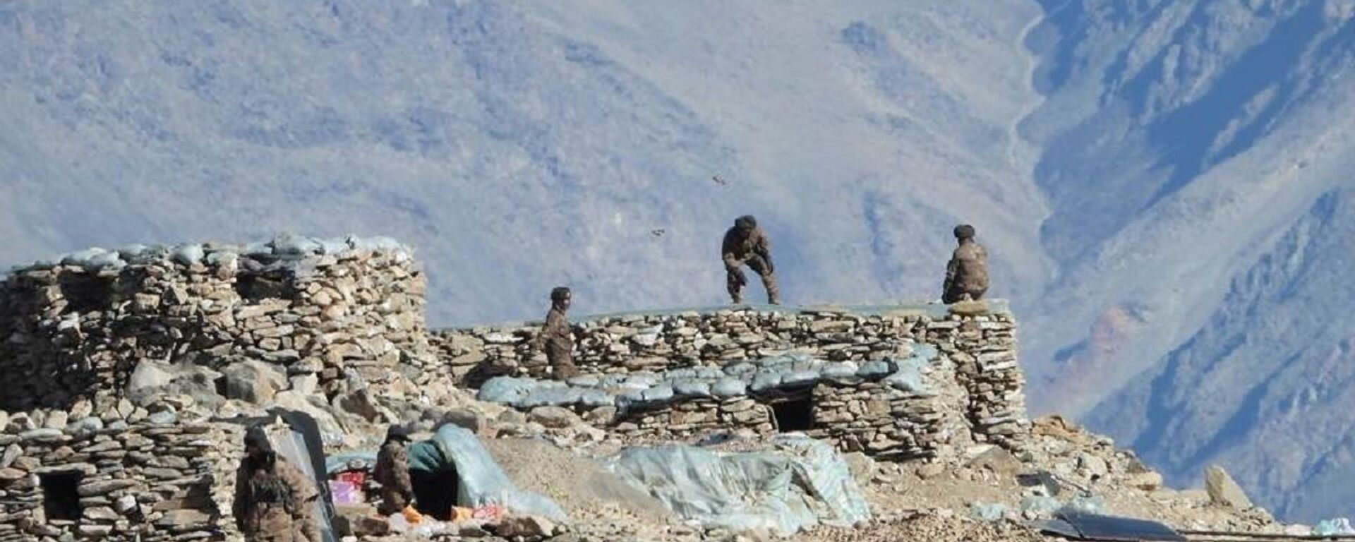 This photograph provided by the Indian Army, according to them shows Chinese troops dismantling their bunkers at Pangong Tso region, in Ladakh along the India-China border on Monday, Feb.15, 2021 - Sputnik भारत, 1920, 14.11.2023