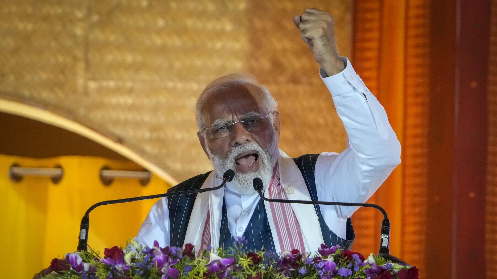 Indian Prime Minister Narendra Modi speaks during an event to attempt Guinness World Record in the largest folk dance performance category in Guwahati, India, Friday, April 14, 2023.  - Sputnik India, 1920, 01.05.2023