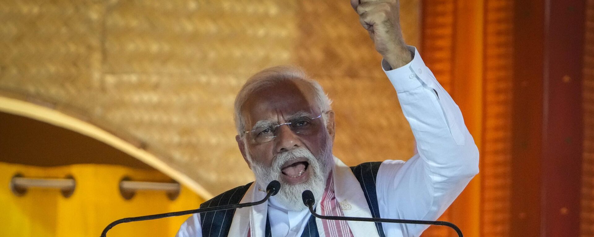 Indian Prime Minister Narendra Modi speaks during an event to attempt Guinness World Record in the largest folk dance performance category in Guwahati, India, Friday, April 14, 2023.  - Sputnik India, 1920, 17.09.2023