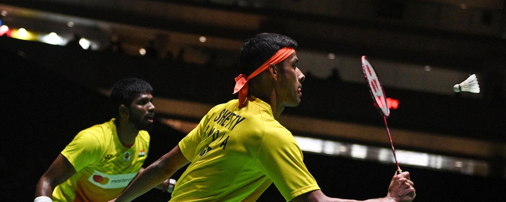 Chirag Shetty (R) and Satwiksairaj Rankireddy (L) of India play a shot against Aaron Chia and Soh Wooi Yik of Malaysia during their men's doubles semi-final match on day six of the Badminton World Championships in Tokyo on August 27, 2022. - Sputnik India, 1920, 01.05.2023