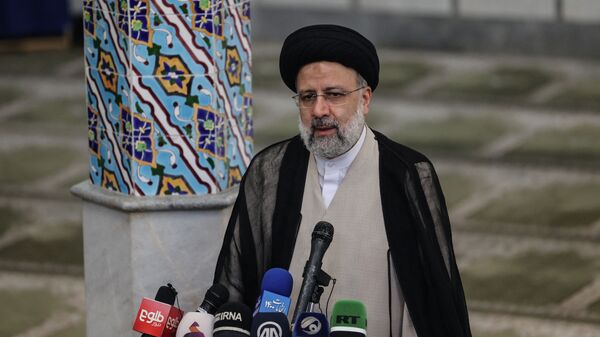 Ebrahim Raisi gives a news conference after voting in the presidential election, at a polling station in the capital Tehran, on June 18, 2021. - Raisi on June 19 declared the winner of a presidential election, a widely anticipated result after many political heavyweights were barred from running. - Sputnik India