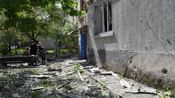 Aftermath of Ukrainian shelling in Lugansk - Sputnik India