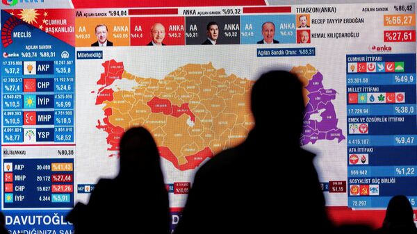 CHP members watch TV after the first results at the CHP building in Istanbul on May 14, 2023, after polls closed in Turkey's presidental and parliamentary elections first round.  - Sputnik India