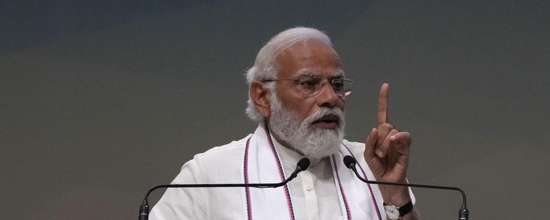 Prime Minister Narendra Modi speaks during a function to dedicate a number of development projects in Gandhinagar, India, Friday, May 12, 2023. - Sputnik India, 1920, 03.06.2023