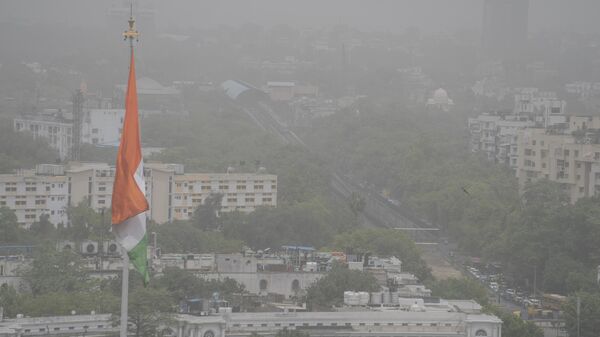Smog envelopes the horizon in New Delhi, India, Tuesday, May, 16, 2023. - Sputnik भारत