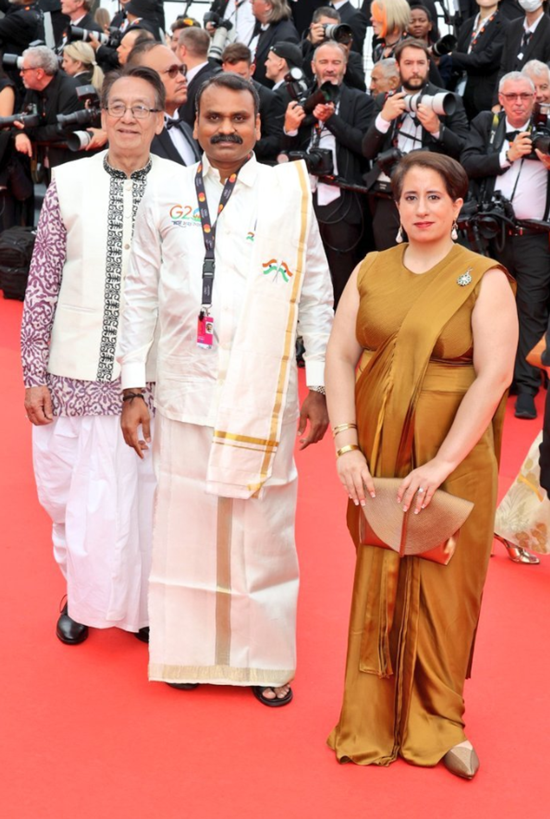 Indian politician and Minister of State for Information and Broadcasting, L. Murugan, shared the red carpet moment at Cannes with film producer Guneet Monga and veteran Manipuri actor Kangabam Tomba. - Sputnik India, 1920, 17.05.2023