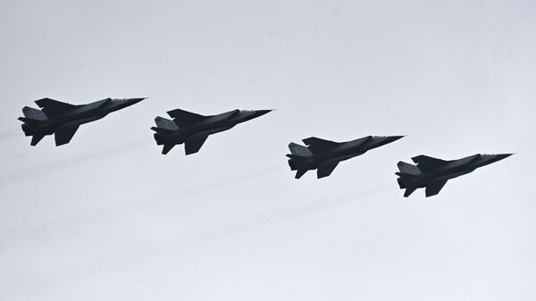 Mig-31Ks armed with Kinzhal hypersonic missiles fly over Moscow during the parade. - Sputnik भारत