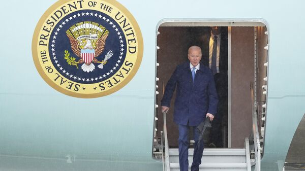 U.S. President Joe Biden walks down the steps of Air Force One upon arrival at Marine Corps Air Station Iwakuni, western Japan, Thursday, May 18, 2023, en route to Hiroshima for the Group of Seven nations' summit that starts Friday. - Sputnik India