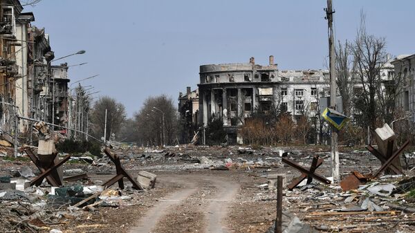 View on destroyed buildings on Liberty Square, center of Artemovsk - Sputnik India