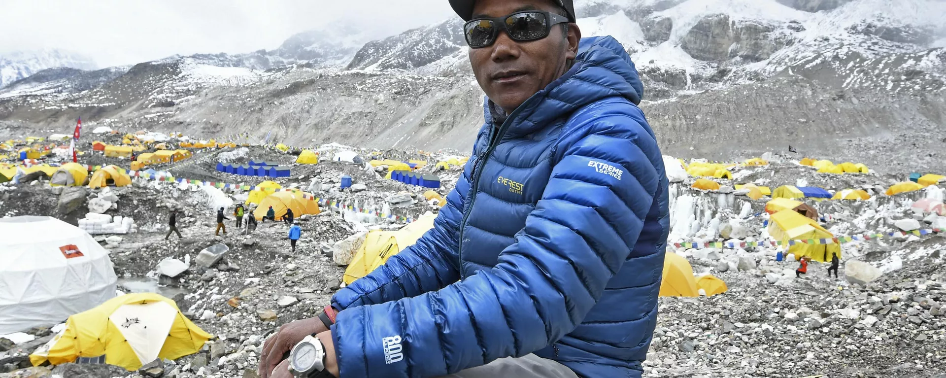 In this photograph taken on May 2, 2021, Nepal's mountaineer Kami Rita Sherpa poses for a picture during an interview with AFP at the Everest base camp in the Mount Everest region of Solukhumbu district, as Sherpa on May 7 reached the summit of Mount Everest for the 25th time, breaking his own record for most summits of the highest mountain in the world. - Sputnik India, 1920, 23.05.2023