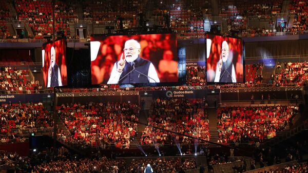 PM Narendra Modi interacts with Indian community at Qudos Bank Arena in Sydney - Sputnik India