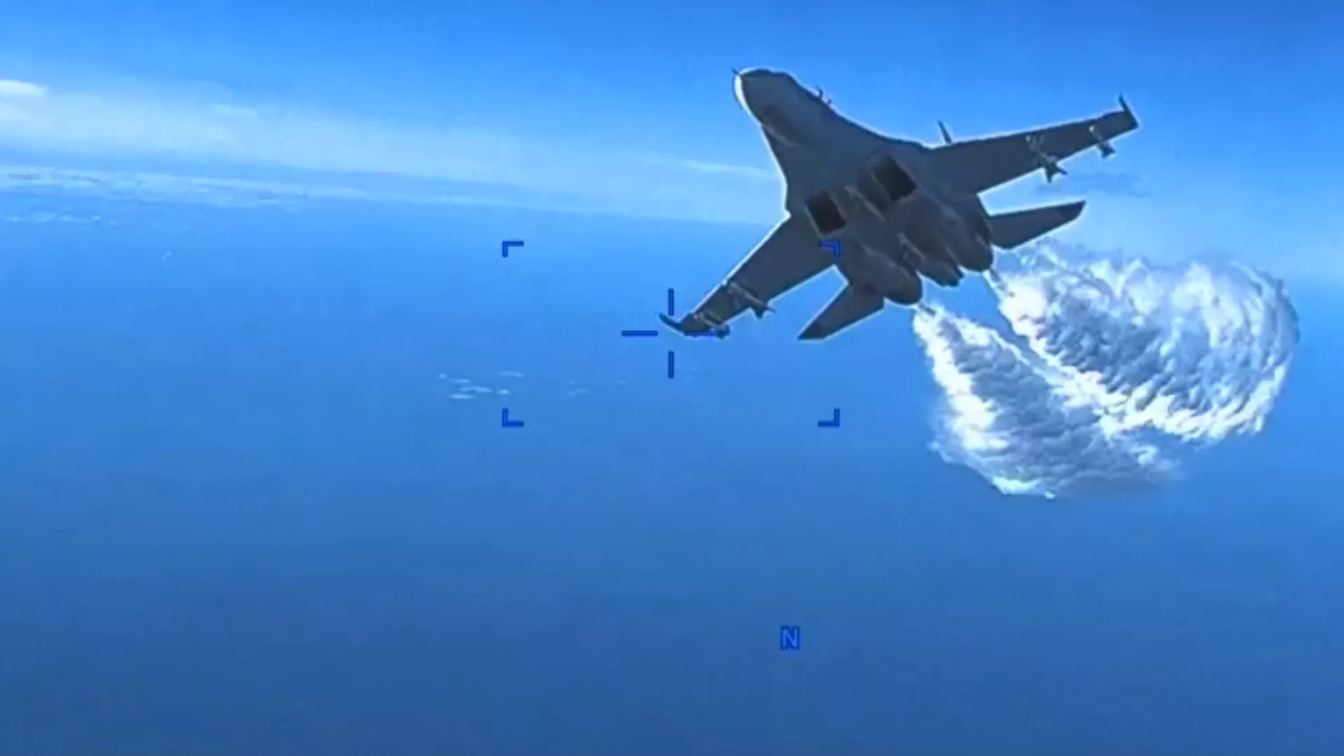 Screengrab of Pentagon video on a US Reaper drone's encounter with a Russian Su-27 fighter jet over the Black Sea.