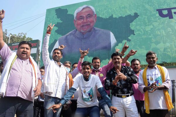 Supporters of Janata Dal (United) celebrate the lead of their party alliance in initial results for the Bihar state assembly polls, in Patna, India, Tuesday, Nov. 10, 2020. Supporters of Janata Dal (United) celebrate the lead of their party alliance in initial results for the Bihar state assembly polls, in Patna, India, Tuesday, Nov. 10, 2020. - Sputnik India