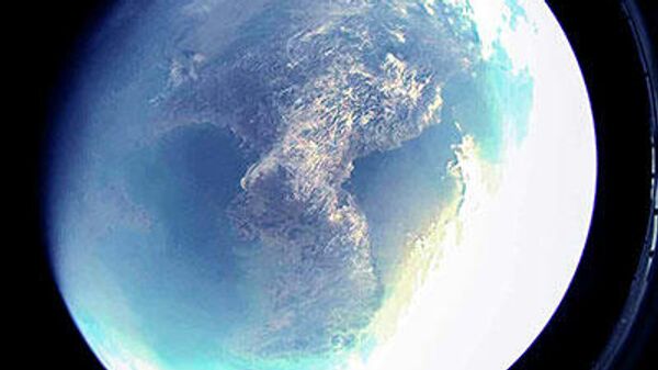 Image taken from camera aboard North Korean rocket conducting satellite test. - Sputnik India