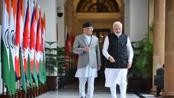 PM Narendra Modi greets PM of Nepal as the latter arrives in Hyderabad House for bilateral talks - Sputnik भारत