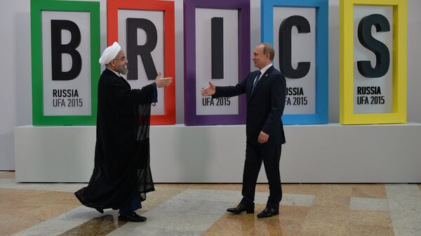 President of the Russian Federation Vladimir Putin, right, and President of the Islamic Republic of Iran Hassan Rouhani at the welcome ceremony for the leaders of the invited states - Sputnik India