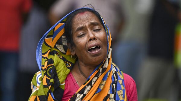 Родственница жертвы столкновения поездов в Индии  - Sputnik भारत