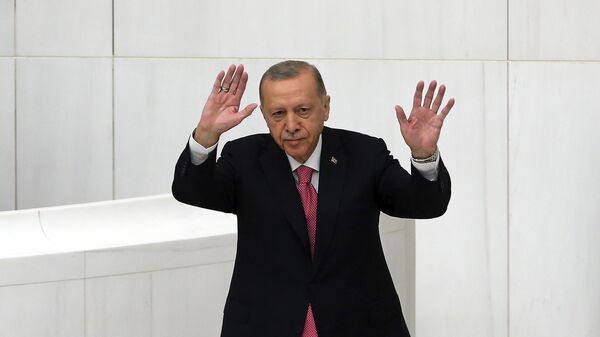 Turkish President Recep Tayyip Erdogan, waves upon his arrival to take the oath, in front of the legislators elected to the Grand National Assembly of Turkey in Ankara, Turkey, Saturday, June 3, 2023. - Sputnik India