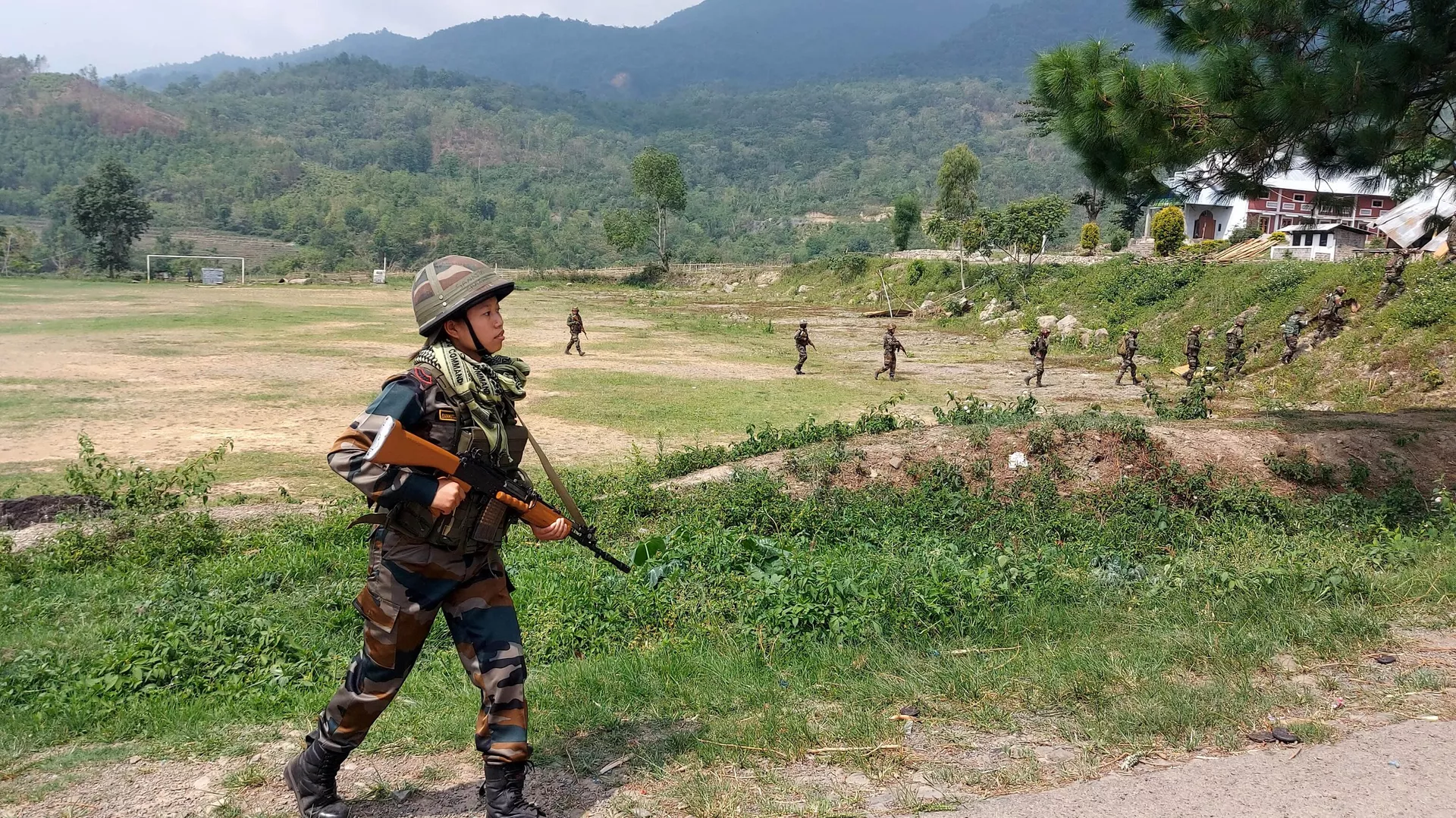 Indian Army and Assam Rifles personnel take part in a search operation of illegal weapons in Waroching village in Kangpokpi district some 24 km from Imphal on June 3, 2023, following ongoing ethnic violence in India's northeastern Manipur state. 