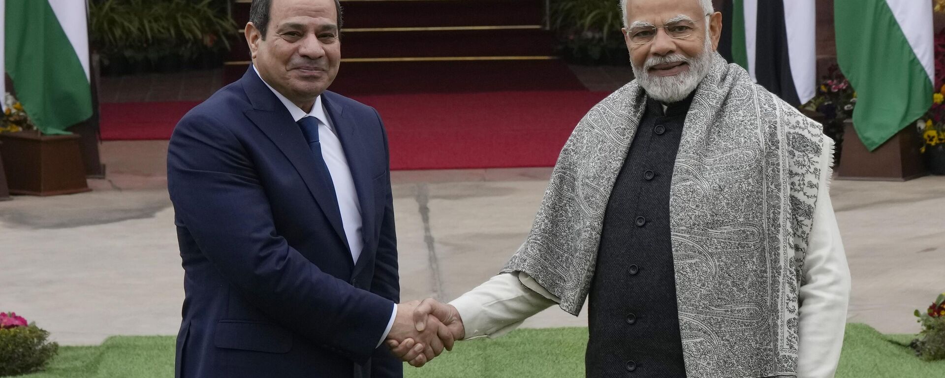 Indian Prime Minister Narendra Modi, right, shakes hand with Egyptian President Abdel Fattah El-Sisi before the start of their meeting in New Delhi, India, Wednesday, Jan. 25, 2023. - Sputnik India, 1920, 24.06.2023