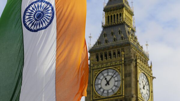 An Indian Flag hangs near the London landmark Big Ben - Sputnik भारत