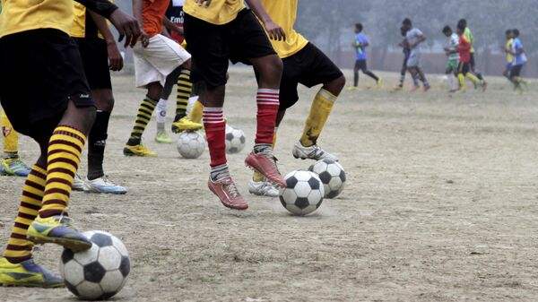 Indian players practice at a soccer camp in Kolkata, India - Sputnik भारत