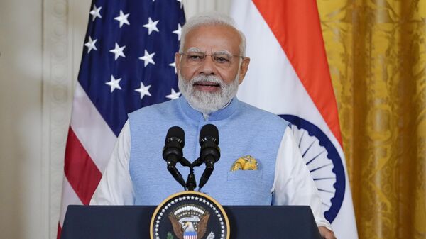 India's Prime Minister Narendra Modi speaks during a news conference with President Joe Biden in the East Room of the White House in Washington, Thursday, June 22, 2023. - Sputnik India