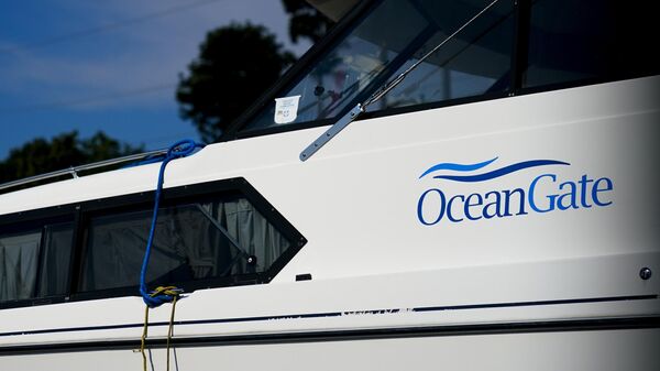 A boat with the OceanGate logo is parked on a lot near the OceanGate offices - Sputnik India