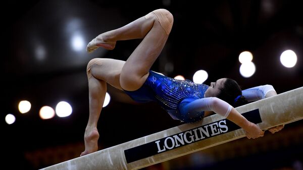 Grace & Poise: Female Athletes Stun World Artistic Gymnastics Championship - Sputnik India