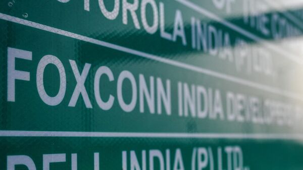 A signboard mentions the plot number of Foxconn India production unit - Sputnik India