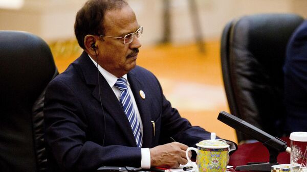 Indian National Security Advisor Ajit Doval attends a meeting between Chinese President Xi Jinping and the delegation from the seventh meeting of BRICS senior representatives on security issues at the Great Hall of the People in Beijing, China, Friday, July 28, 2017.  - Sputnik India