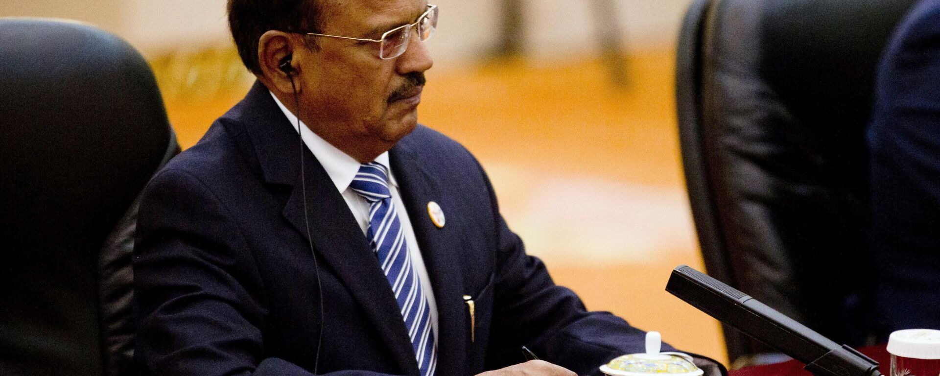 Indian National Security Advisor Ajit Doval attends a meeting between Chinese President Xi Jinping and the delegation from the seventh meeting of BRICS senior representatives on security issues at the Great Hall of the People in Beijing, China, Friday, July 28, 2017.  - Sputnik भारत, 1920, 20.06.2026